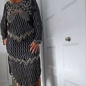 Dress with sequins and pearls